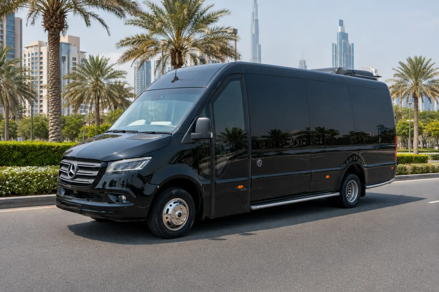 Illustrative black Mercedes Sprinter van with closed doors on a Dubai road for a sixteen-seat supplier enquiry