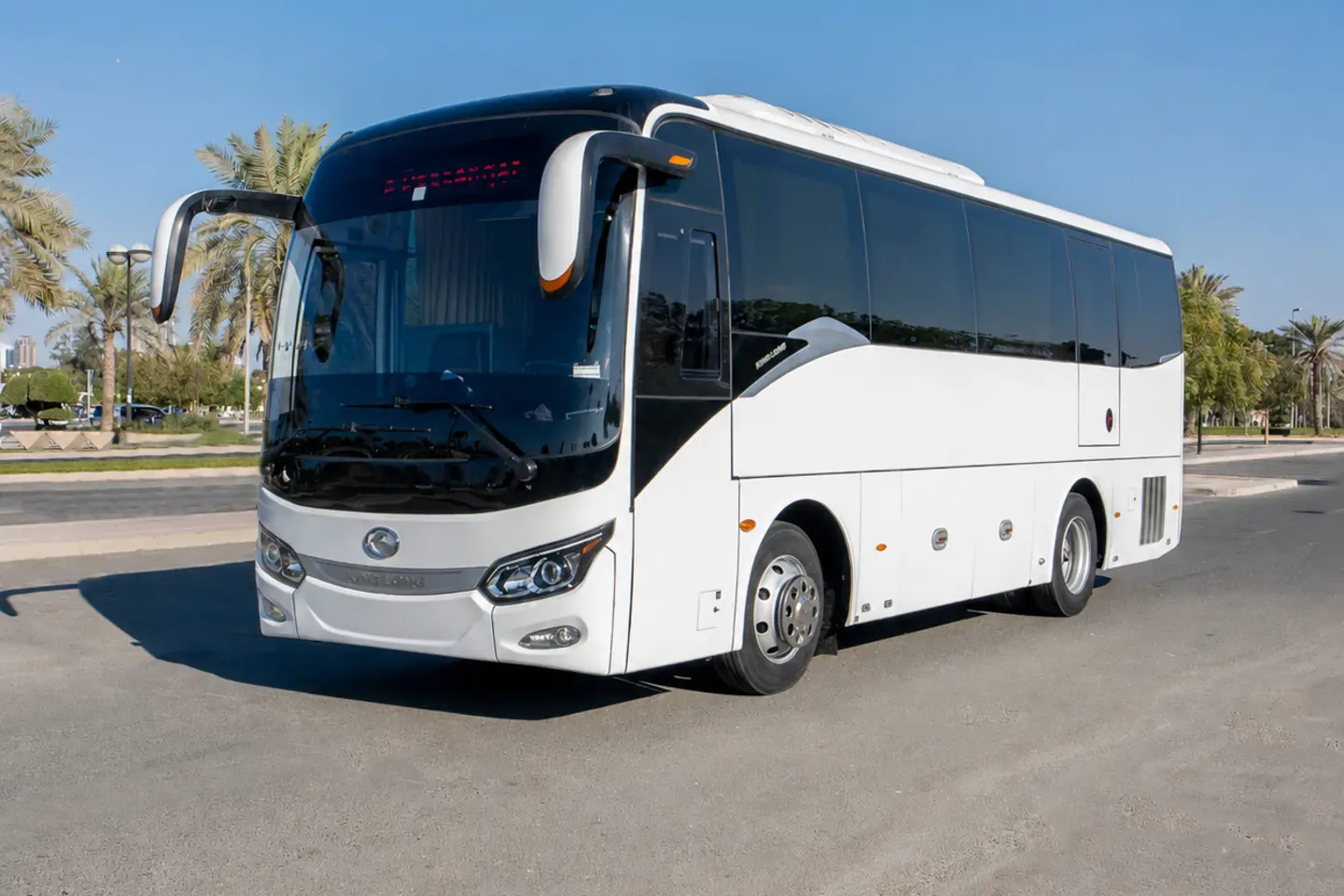 Illustrative white group coach in Dubai for a 35-seater bus with driver enquiry