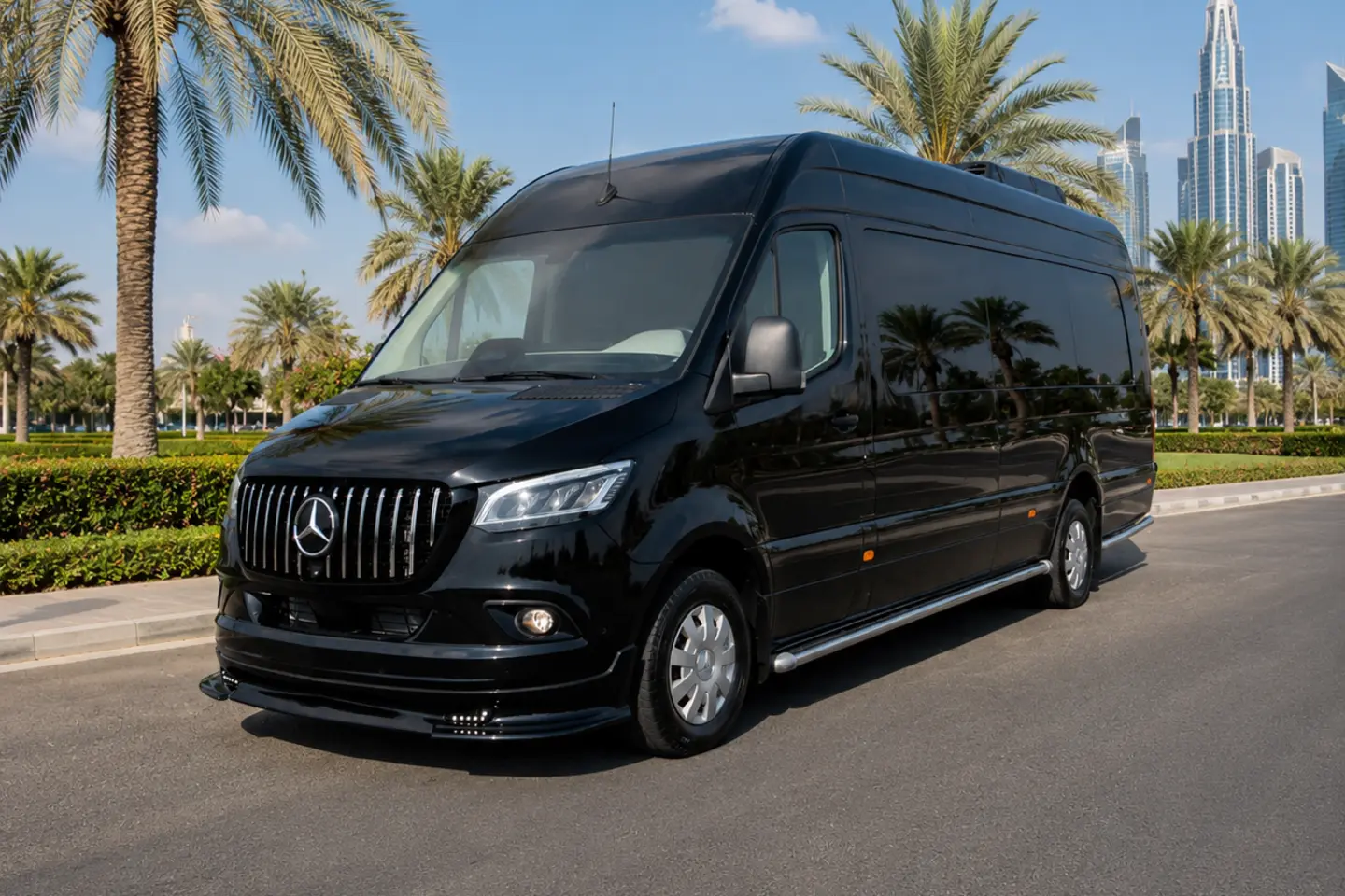 Illustrative black Mercedes Sprinter with closed doors on a Dubai boulevard for a private nine-passenger van request