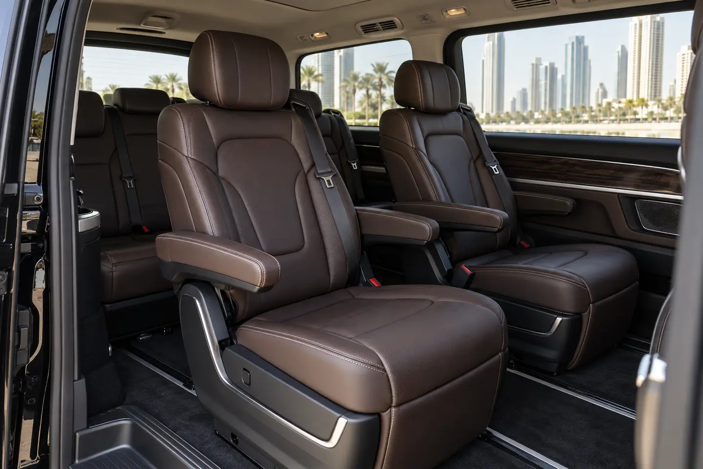 Illustrative dark leather Mercedes V-Class executive passenger cabin for a V300 chauffeur request