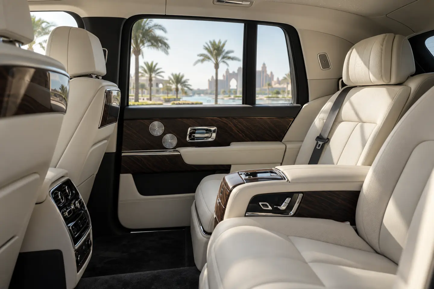Illustrative cream leather Rolls-Royce Cullinan rear passenger cabin for Dubai chauffeur travel